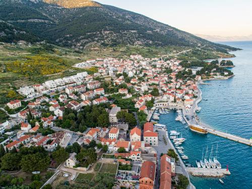 an aerial view of a town on the water at Apartments Villa Azzurra Bol in Bol