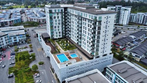 an overhead view of a large building in a city at Kuching Tabuan Tranquility Apartment TT3 Soho C11 in Kuching