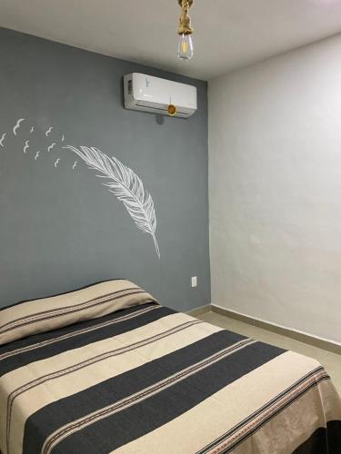 Postel nebo postele na pokoji v ubytování Departamentos cherris