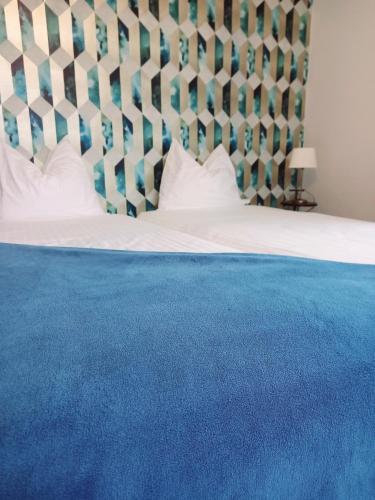 Ένα ή περισσότερα κρεβάτια σε δωμάτιο στο Bed & Breakfast de Wandhorst