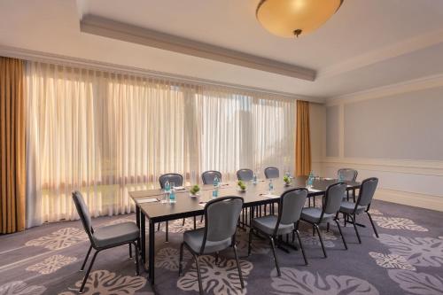 a conference room with a long table and chairs at Lisbon Marriott Hotel in Lisbon