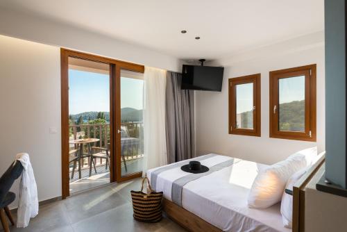 Posteľ alebo postele v izbe v ubytovaní Neoma Luxury Residence - Adults Only