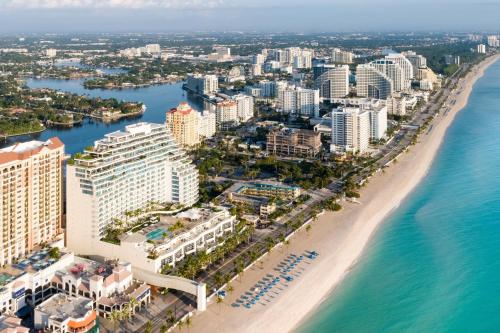 an aerial view of the beach and buildings at The Ritz-Carlton, Fort Lauderdale in Fort Lauderdale