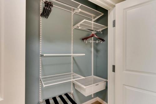 a walk in closet with white shelving at TownePlace Suites Houston I-10 East in Houston