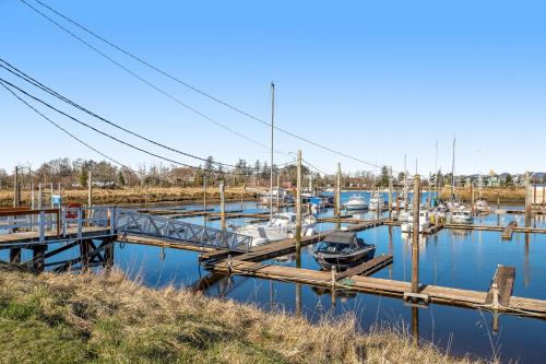 a group of boats docked at a marina at Surfside | Suite on the Sea in Gearhart