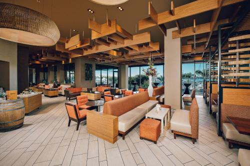 a lobby of a hotel with couches and tables at Marriott Marquis San Diego Marina in San Diego