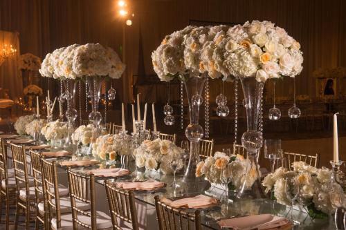 a group of tables with white flowers on them at Marriott Marquis San Diego Marina in San Diego