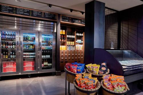 a store with bottles of alcohol and baskets of food at Renaissance Nashville Hotel in Nashville