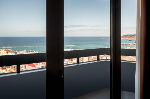 a view of the ocean from a hotel room window at AC Hotel Gran Canaria by Marriott in Las Palmas de Gran Canaria