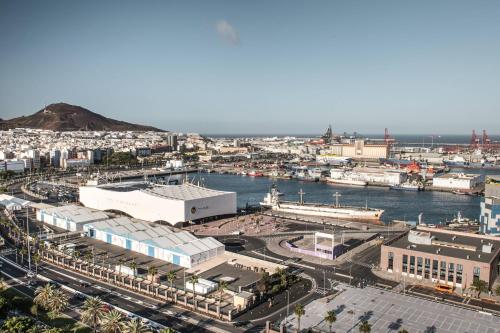 an aerial view of a city with a body of water at AC Hotel Gran Canaria by Marriott in Las Palmas de Gran Canaria
