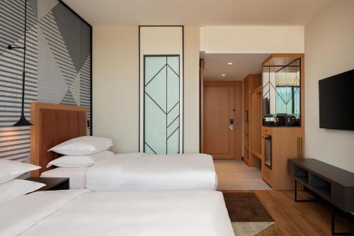 Ένα ή περισσότερα κρεβάτια σε δωμάτιο στο Sheraton Istanbul Esenyurt