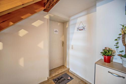 a staircase in a room with a stair case at Gipfelstürmer in Nesselwang