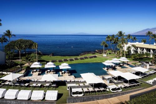 an aerial view of a resort with a pool and the ocean at Wailea Beach Resort - Marriott, Maui in Wailea