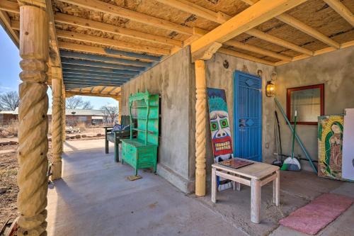 a porch of a house with a wooden ceiling at Santa Cruz Home with Mountain Views! in Santa Cruz