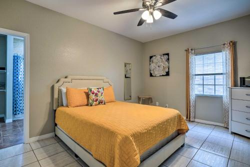 a bedroom with a bed and a ceiling fan at Pet-Friendly San Antonio Vacation Rental! in San Antonio