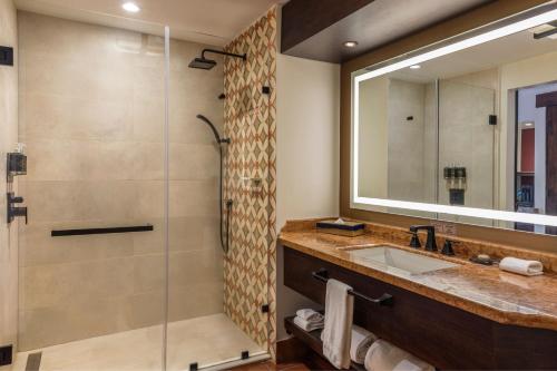 a bathroom with a sink and a shower at Costa Rica Marriott Hotel Hacienda Belen in San José