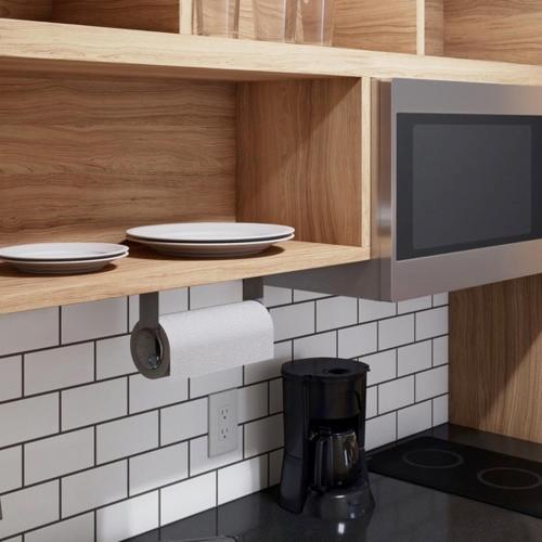 a kitchen with a counter with plates and a microwave at Candlewood Suites-Augusta by IHG in Augusta