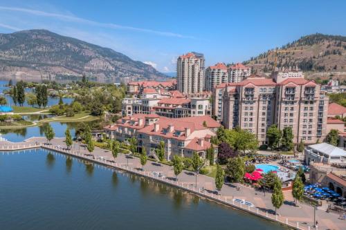 an aerial view of a resort next to a body of water at Delta Hotels by Marriott Grand Okanagan Resort in Kelowna