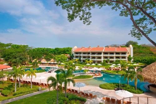 an aerial view of a resort with a pool at The Westin Reserva Conchal, an All-Inclusive Golf Resort & Spa in Playa Conchal
