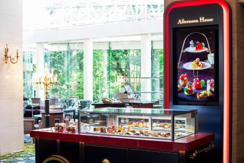 a display case in a restaurant with avertisement for at The Westin Osaka in Osaka