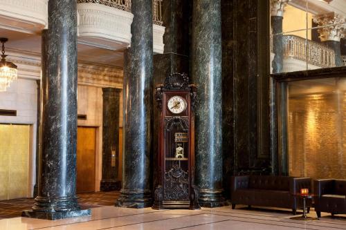 a clock in the middle of a room with columns at The Westin St. Francis San Francisco on Union Square in San Francisco