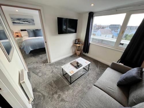 Μια τηλεόραση ή/και κέντρο ψυχαγωγίας στο Coach Guest House