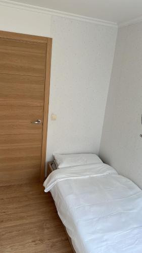 Postel nebo postele na pokoji v ubytování Alojamiento Pichi