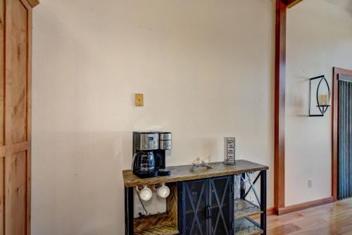 a kitchen with a counter with a coffee maker on it at Twin Pines Cabin in Wilderness Ranch on Hwy 21, AMAZING Views, 20 ft ceilings, fully fenced yard, pet friendly, , Go paddle boarding at Lucky Peak, or snowshoeing in Idaho City and take in the hot springs, sleeps 10! in Boise