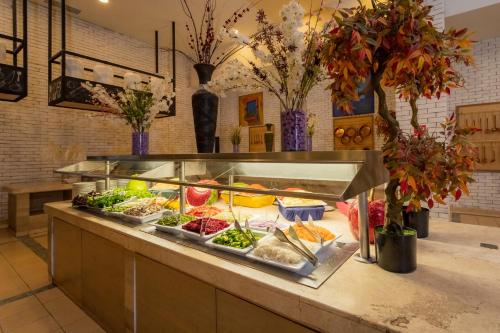 a buffet line with many different types of food at Royal Solaris Los Cabos - All Inclusive in San José del Cabo