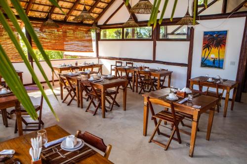 En restaurant eller et andet spisested på Vivant Eco Beach OFICIAL