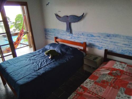 Postel nebo postele na pokoji v ubytování Casa tranquila Massaguaçu