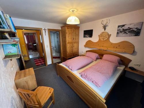 Cama o camas de una habitación en Alpenfrieden