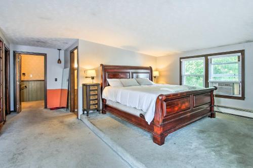 a bedroom with a large bed and a window at Large Maine Home - 5 Min Walk to Old Orchard Beach in Old Orchard Beach