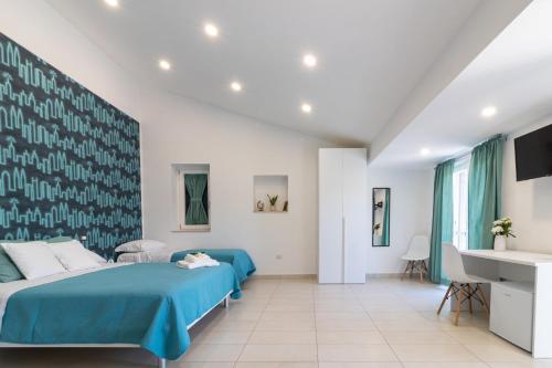 Postel nebo postele na pokoji v ubytování B&B MicAnTo