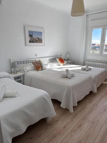 Кровать или кровати в номере Hotel Consuegra