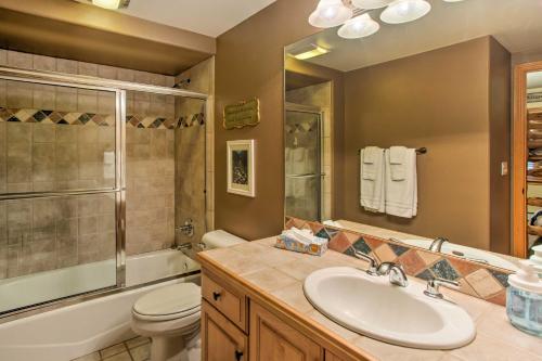 a bathroom with a sink and a toilet and a shower at Steamboat Springs Townhome 1 Block to Ski Lifts! in Steamboat Springs