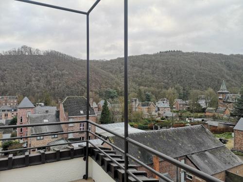a view of a city from a balcony at Villa Michaux in Hastière-par-delà