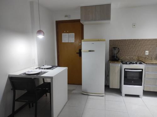 Dapur atau dapur kecil di Lindo Flat frente praia