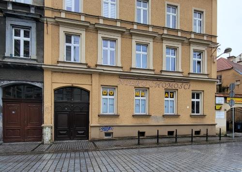 a building on the side of a street at Apartament Za Murami Gliwice in Gliwice