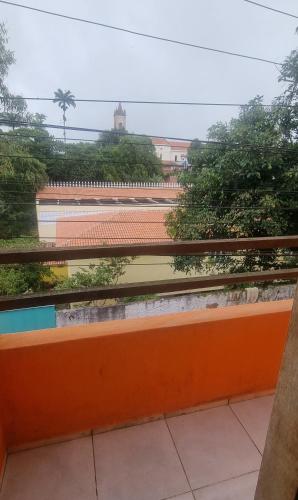 a view from the balcony of a building at Suites Solar dos Arcanjos Guaramiranga in Guaramiranga