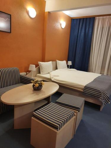 Postel nebo postele na pokoji v ubytování Hotel Perfect