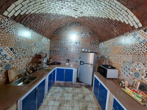 Kuchyň nebo kuchyňský kout v ubytování Mostafa guesthouse
