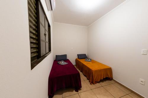 Postel nebo postele na pokoji v ubytování Jahu Center Casas