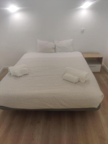 Katil atau katil-katil dalam bilik di Guesthouse Évora