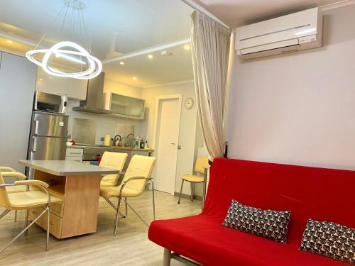 A seating area at Camp Nou, Europa Fira - modern two-bedroom apartment with heating