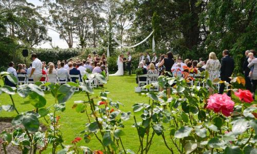 a group of people sitting in chairs in a garden at Hemsworth Estate in Elgin