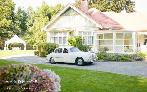 a white car parked in front of a house at Hemsworth Estate in Elgin