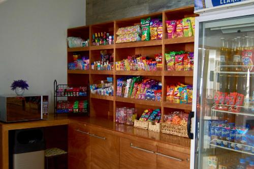 a store filled with lots of different types of chips at Hotel del Alba Inn & Suites in Aguascalientes