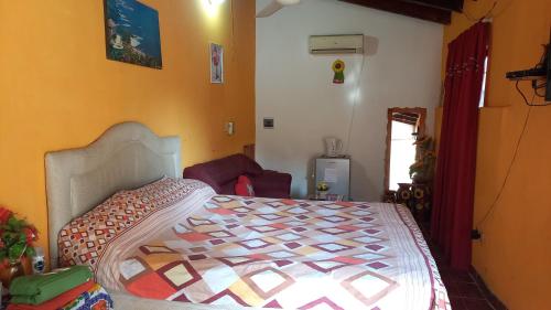 Giường trong phòng chung tại Hospedaje Luque