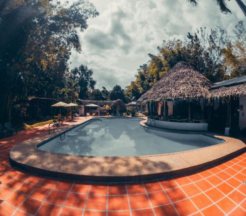 Bazén v ubytování TAGUA LODGE nebo v jeho okolí
